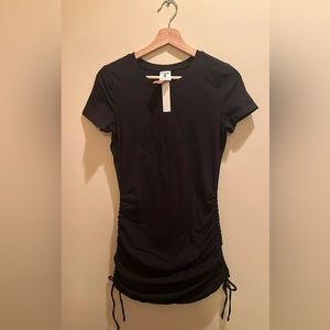New with tags, never worn, a cute side tie dress for everyday or beach wear
